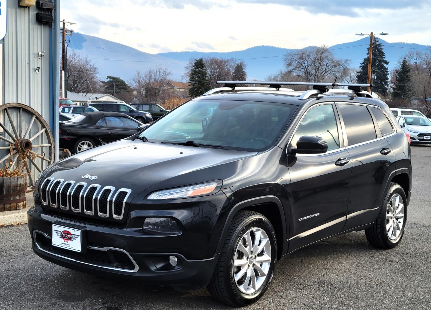 2015 Black /Black Jeep Cherokee Limited (1C4PJMDS4FW) with an 3.2L V6 engine, Automatic transmission, located at 450 N Russell, Missoula, MT, 59801, (406) 543-6600, 46.874496, -114.017433 - Nice Jeep. Lots of Features. 4 Wheel Drive. Automatic. Huge Sunroof. Leather Heated Seats. Power Drivers Seat. Heated Steering Wheel. Bluetooth. Steering Wheel Controls. Air. Cruise. Tilt. Power Windows and Locks. Towing. - Photo#1